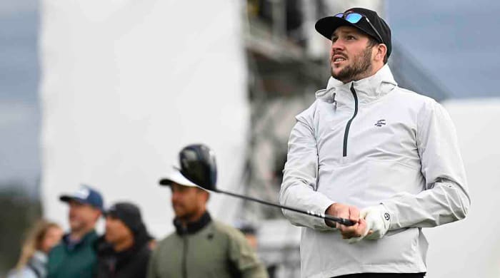 NFL quarterback Josh Allen hits his tee shot at the 18th hole during the 2024 AT&T Pebble Beach Pro-Am in Pebble Beach, Calif.